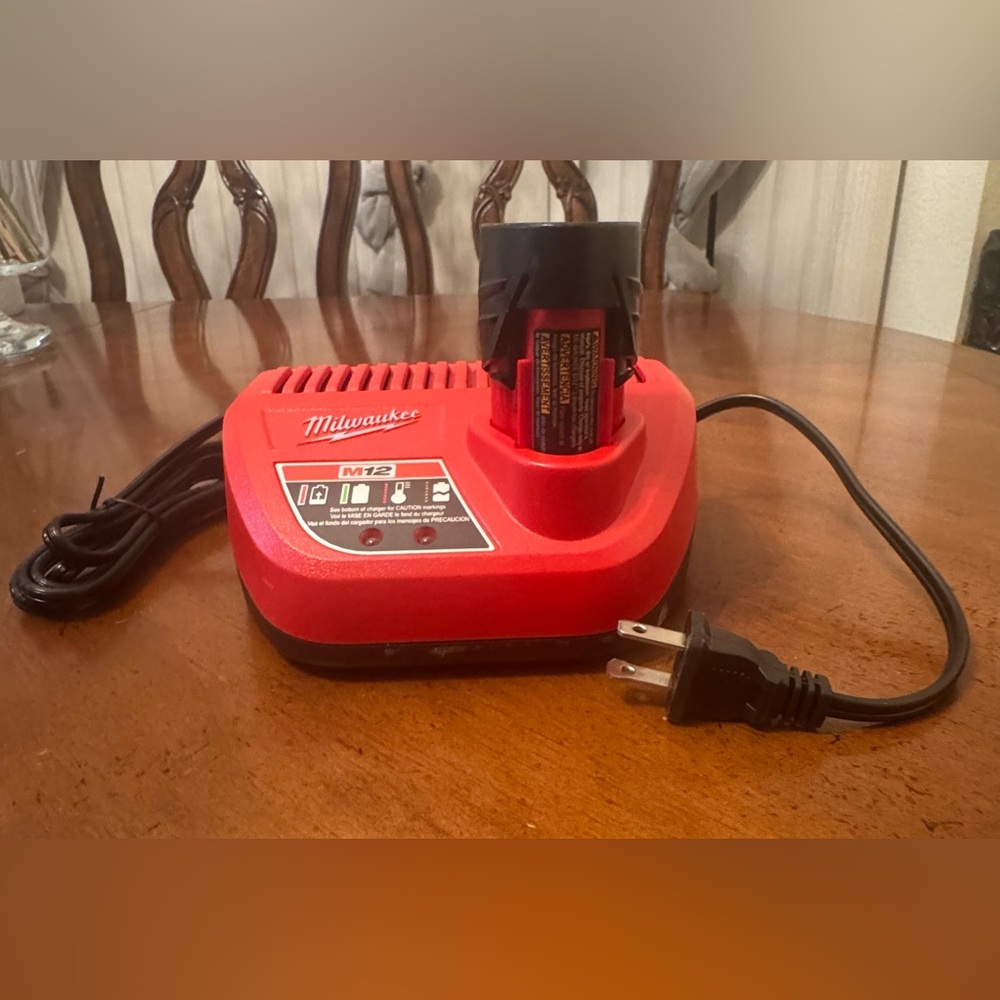 Milwaukee M12 12-Volt Lithium-Ion Compact Battery Pack 2.0Ah and Charger Starter